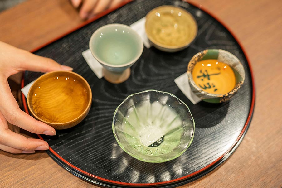 Enjoy drinks at an izakaya pub