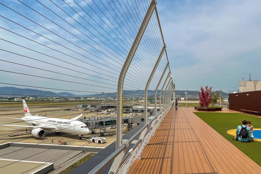 Watch the runway from the rooftop observation deck