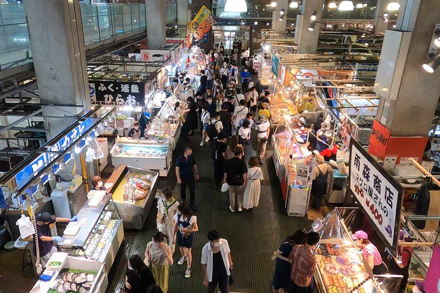 Savor a seafood lunch and chat with local fishmongers at Karato Market