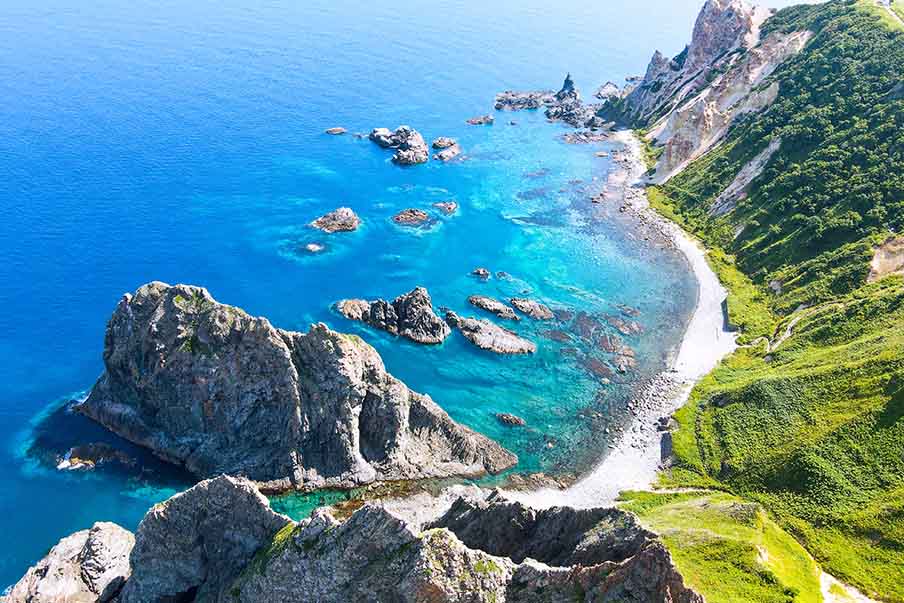 Shimamui Beach (島武意海岸) — boasting of rugged cliffs and a rocky coastline