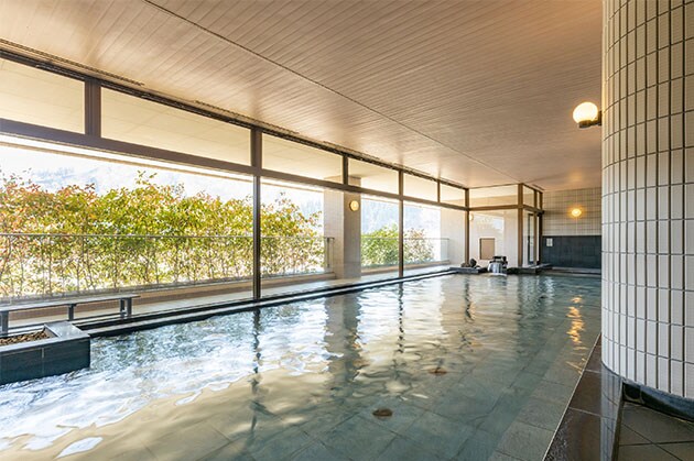 Relax at the onsen hot springs at NASPA New Otani Resort