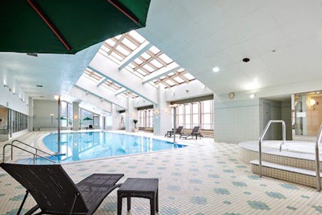 Jump into the pool and train at the NASPA New Otani Resort fitness center