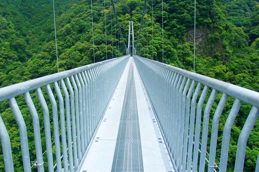 Experience dizzying heights when you walk across the Ayanoteruhaotsuri Suspension Bridge