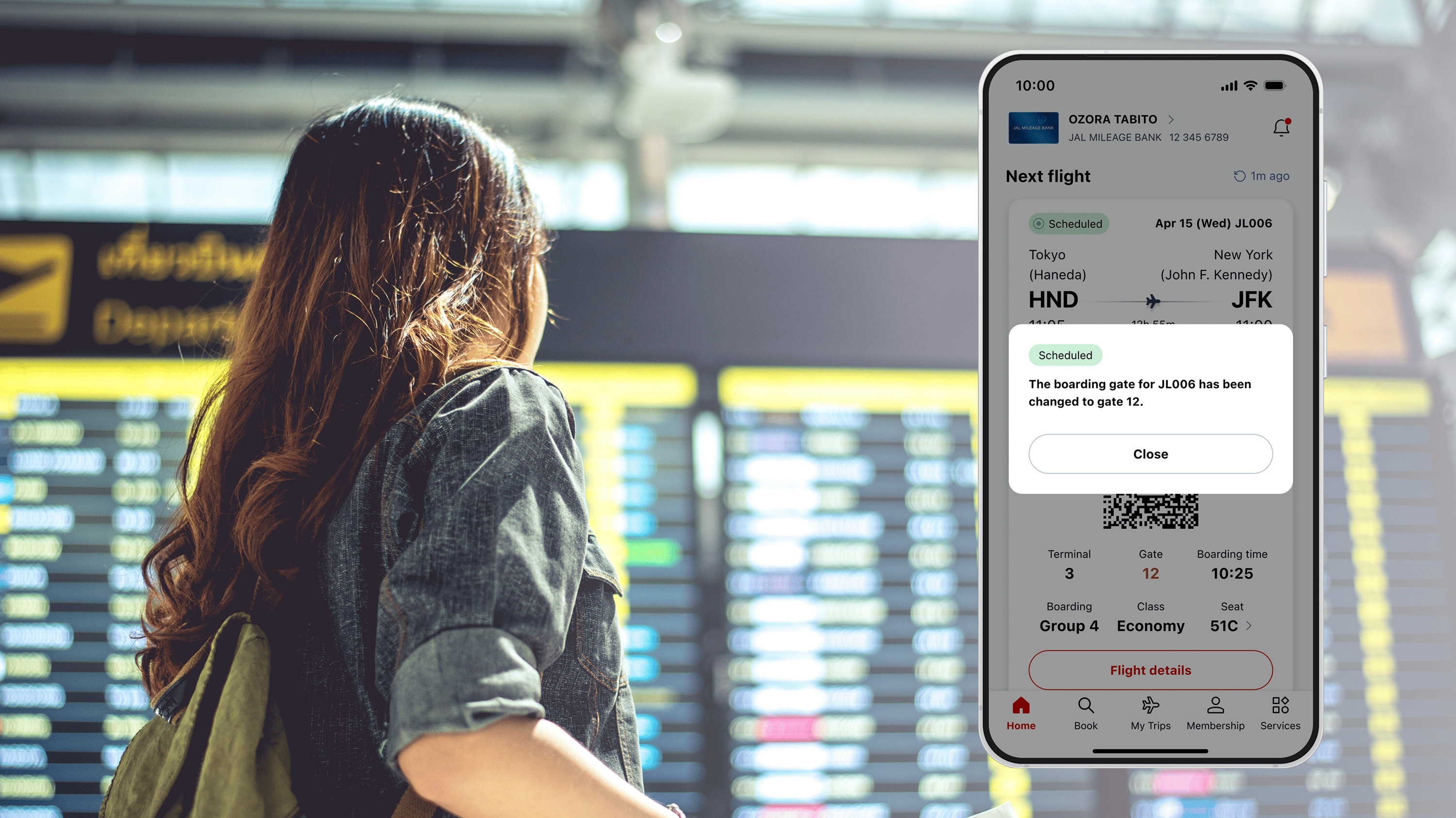 Mockup image showing notification alerts and booking information on the JAL app